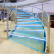 Arc / curved staircase with blue glass steps stainless steel stringer glass stair