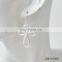Worn goldworn silver knot earring