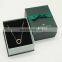 Dark green papre gift bag with ribbon handle