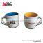 colored ceramic mug with spoon and lit