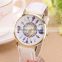 promotion gifts lady leather wrist watch with feather design,gold electro-plated quartz wrist watch