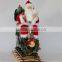 XM-CH1401 22 inch outdoor lighted santa sitting with musical