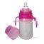 New Arrival Food Grade BPA Free Liquid Silicone Baby Feeding Bottle with Dispensing Spoon&Plastic Storage Cap