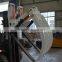 Forklift Attachment With Hinged Broke Handler and Material Handling Clamp
