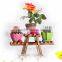 Small potted flower wooden stand
