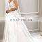 Cut out sleevless white wedding gown for bride