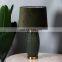 Unique relief surface design green cylinder shape hotel ceramic night lamp for living room