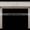 white marble fireplace with flower frame