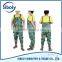 cheap pvc chest high fishing waders being used as waterproof workwear
