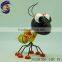 Decorating outdoor garden with folk art metal bee ornaments