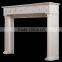white marble fireplace with flower frame