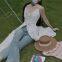 Sweet lace patchwork mid-length halter dress for spring/summer 2025, with an offbeat style for vacation wear.