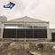 China low cost steel egg farm machine chicken layer poultry farm shed with cooling pad in Pakistan