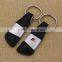 Wholesale free deisgn black genuine / pu leather keychain with embossed logo