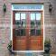 Villa entrance teak wood main double door design with glass