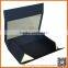 black cardboard flat pack shirt box folding