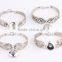 2016 new design snap button bangle gold plating snap button cuff bangle small red stone beads twist bangle
