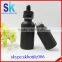 black frosted glass dropper bottle