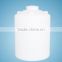 Storage tanks and white chemical plastic drums