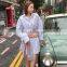 TWOTWINSTYLE Hit Color Patchwork Plaid Shirt For Women Lapel Collar Long Sleeve Lace Up