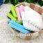 Green silicone soap shelf with groove by the sink