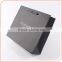 Luxury matte black shopping paper bag with logo embossing for clothing packaging