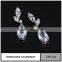Simple gold earring designs for women with big diamond earring