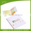 Funny smile faced combination of sticky notepads and adhesive flags