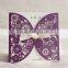 Chic & handmade purple laser cut wedding invitations with white insert cards & white ribbons