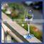 blue colored wine glass, purple colored wine glass, pink colored wine glass