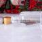 Small wine glass bottle with golden lid odd-shaped glass wine bottle