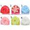 baby knitted hat with big pretty flowers
