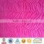 red 100% polyester embossed plush velboa with plastic backing