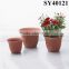 Small colorful round plastic flower pot