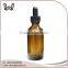 2 oz boston round amber bottle with dropper