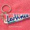 Cute logo silicone/pvc keychain with gold metal link