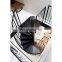 White iron spiral stairs with black handrails