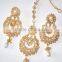 EARRING PAIR WITH TIKA GOLD TONE hair accessory
