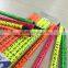 7" standard size round shape neon color body black wood pencil with heat rolling logo