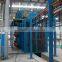 Overhead rail conveyor products cleaning machine
