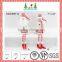 Red and white christmas long legs sitting