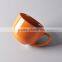 Colorful glazed ceramic soup bowl with handle