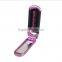 Folding pocket mirror with comb