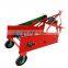 walking tractor driven carrot harvest machine