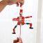 Children play wooden string toy game