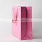 cheap shopping paper bags,factory cheap pink paper gift bag