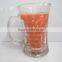 candle in glass jar