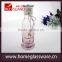 Spraying decal glass storage bottle with string decor china supplier