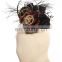 Steampunk mini hat fascinator with flowers and gears
