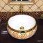 Golden color ceramic round shape tabletop bathroom new design color single hole hotel wash hand basin
